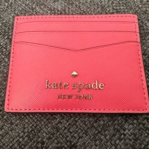 Kate Spade small card wallet. Never been used.